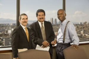 brother jeff with David Miller, former president & CEO (left) and Rich Lopez, former trustee (center).